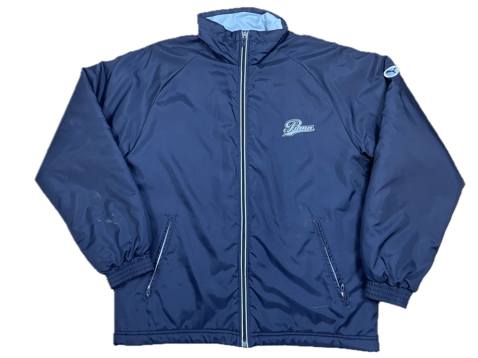 Real Vintage Puma Jacke Dunkelblau L - Klassische und Bequeme Jacke Vintage Klamotten, Secondhand Klamotten, Retro Mode, Nachhaltige Mode, Einzigartige Stücke, Zeitlose Mode, Umweltfreundliche Kleidung, Stilvolle Secondhand Mode, Hochwertige Vintage Kleidung