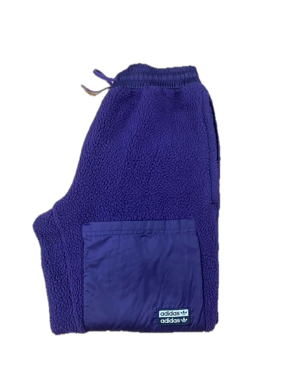 Vintage Adidas Fleece Jogginghose Lila XS - Schicke und Beqeume Damen Sporthose Vintage Klamotten, Secondhand Klamotten, Retro Mode, Nachhaltige Mode, Einzigartige Stücke, Zeitlose Mode, Umweltfreundliche Kleidung, Stilvolle Secondhand Mode, Hochwertige Vintage Kleidung