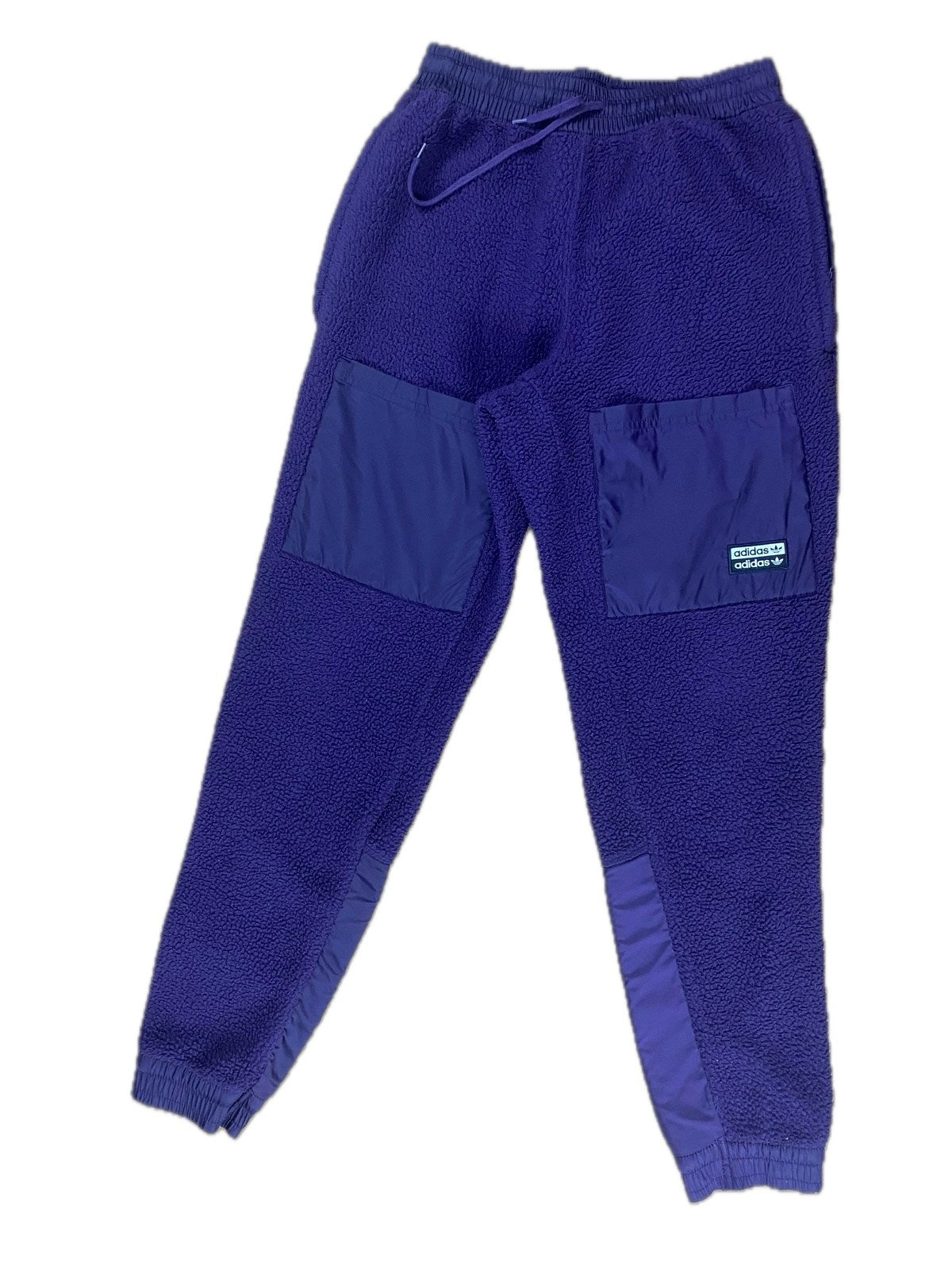 Vintage Adidas Fleece Jogginghose Lila XS - Schicke und Beqeume Damen Sporthose Vintage Klamotten, Secondhand Klamotten, Retro Mode, Nachhaltige Mode, Einzigartige Stücke, Zeitlose Mode, Umweltfreundliche Kleidung, Stilvolle Secondhand Mode, Hochwertige Vintage Kleidung