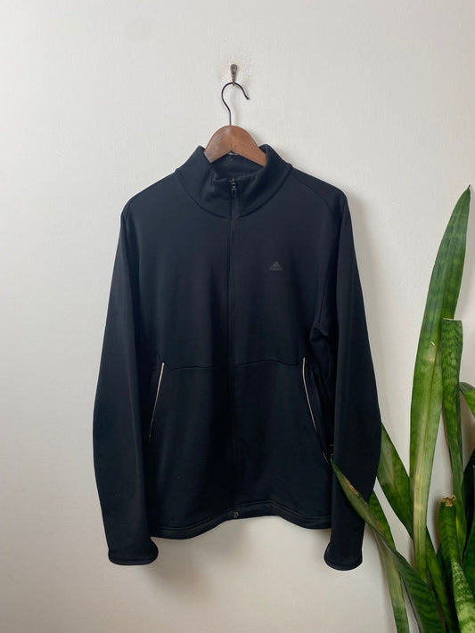 Vintage Adidas Trainingsjacke Climawarm Schwarz M - Funktionale und Bequeme Jacke Vintage Klamotten, Secondhand Klamotten, Retro Mode, Nachhaltige Mode, Einzigartige Stücke, Zeitlose Mode, Umweltfreundliche Kleidung, Stilvolle Secondhand Mode, Hochwertige Vintage Kleidung