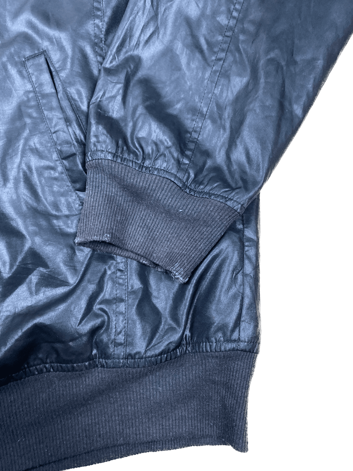 Vintage FILA Leichte Jacke Schwarz/Grau XXL - Lockere Herren Jacke Vintage Klamotten, Secondhand Klamotten, Retro Mode, Nachhaltige Mode, Einzigartige Stücke, Zeitlose Mode, Umweltfreundliche Kleidung, Stilvolle Secondhand Mode, Hochwertige Vintage Kleidung