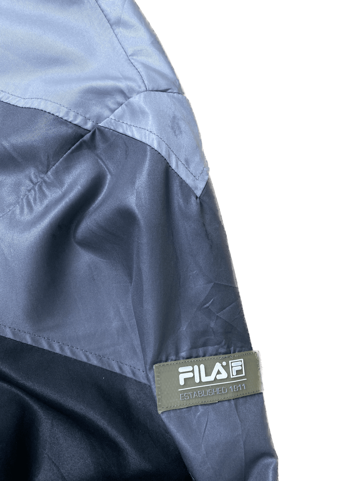 Vintage FILA Leichte Jacke Schwarz/Grau XXL - Lockere Herren Jacke Vintage Klamotten, Secondhand Klamotten, Retro Mode, Nachhaltige Mode, Einzigartige Stücke, Zeitlose Mode, Umweltfreundliche Kleidung, Stilvolle Secondhand Mode, Hochwertige Vintage Kleidung