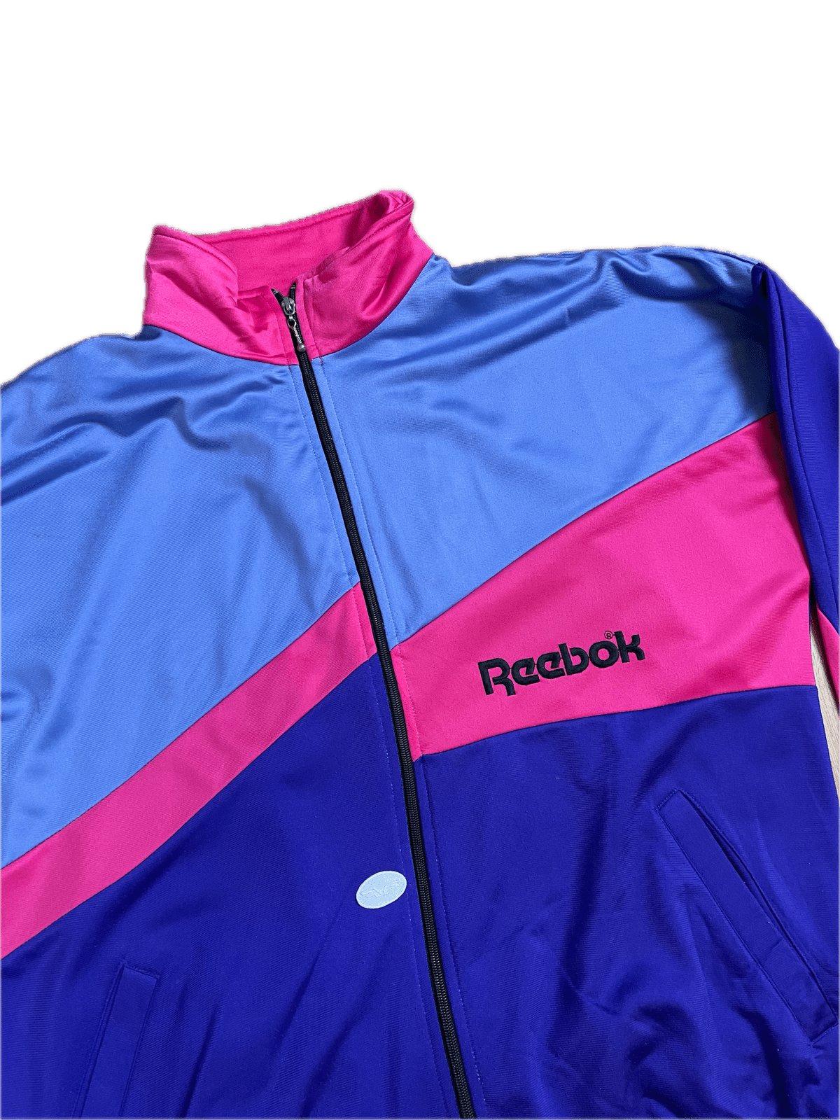 Vintage Reebok Trainingsjacke Bunt/Lila/Pink XL - Auffällige und Bequeme Jacke Vintage Klamotten, Secondhand Klamotten, Retro Mode, Nachhaltige Mode, Einzigartige Stücke, Zeitlose Mode, Umweltfreundliche Kleidung, Stilvolle Secondhand Mode, Hochwertige Vintage Kleidung